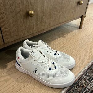 On The Roger Spin Men's Sneakers in White with Blue Accents